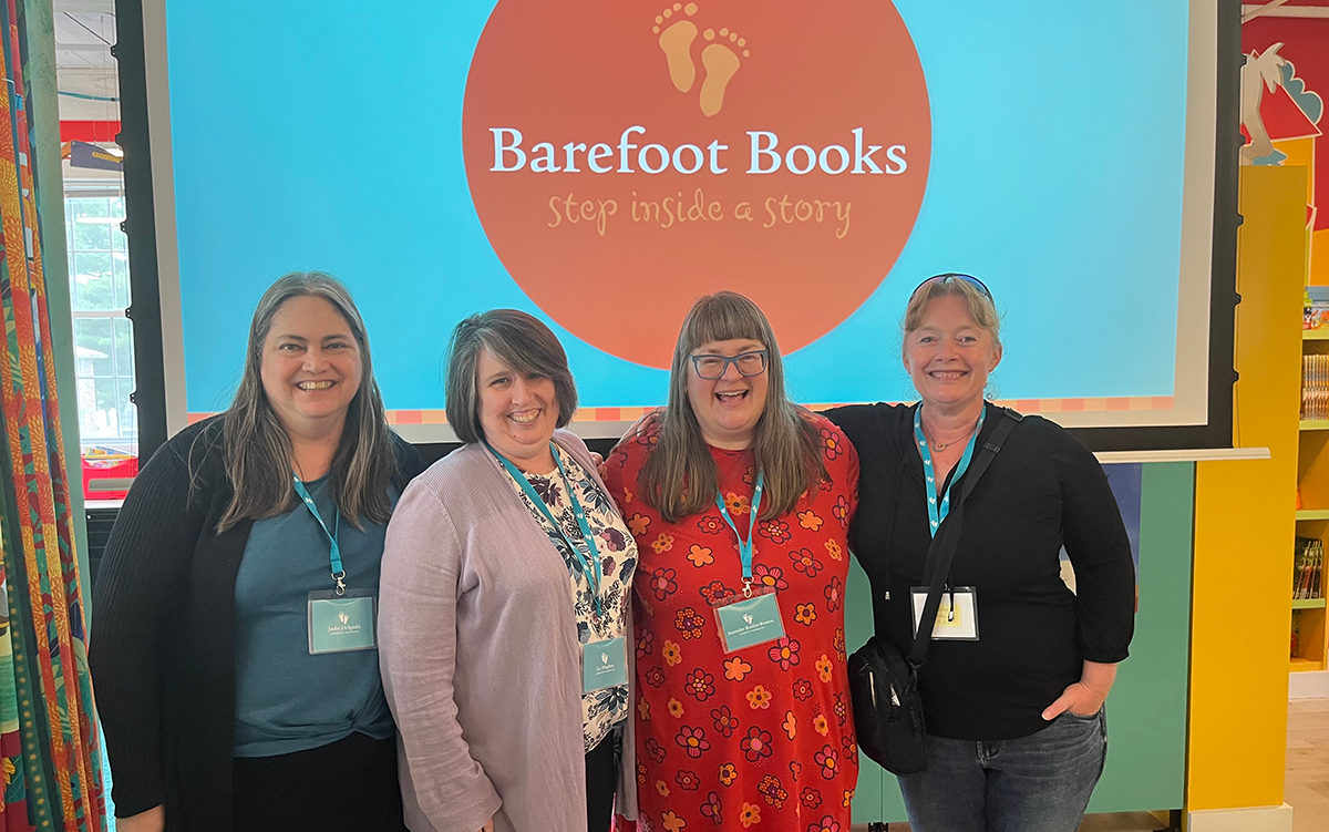 Community Booksellers standing with Barefoot CEO Nancy